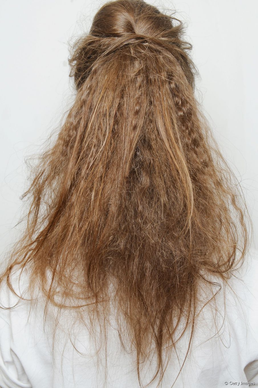 Frisurentrends: gekräuselte Haare für Neu  